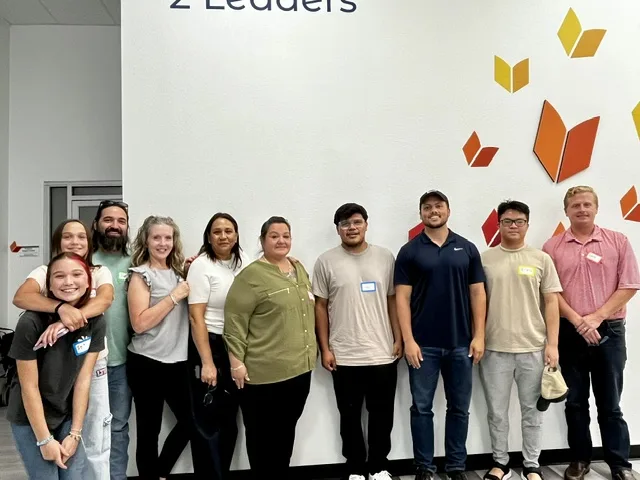 Group of volunteers posing together after a community service event
