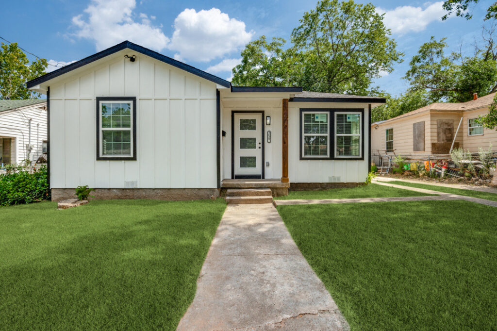 Renovated single-family home with white board-and-batten siding at 3630 Glenhaven Blvd